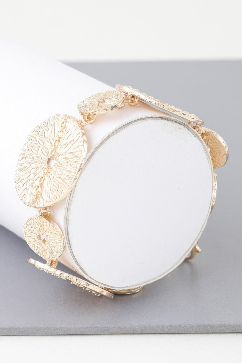 Gold Multi Hammered Disc Bracelet with scalloped discs and clasp