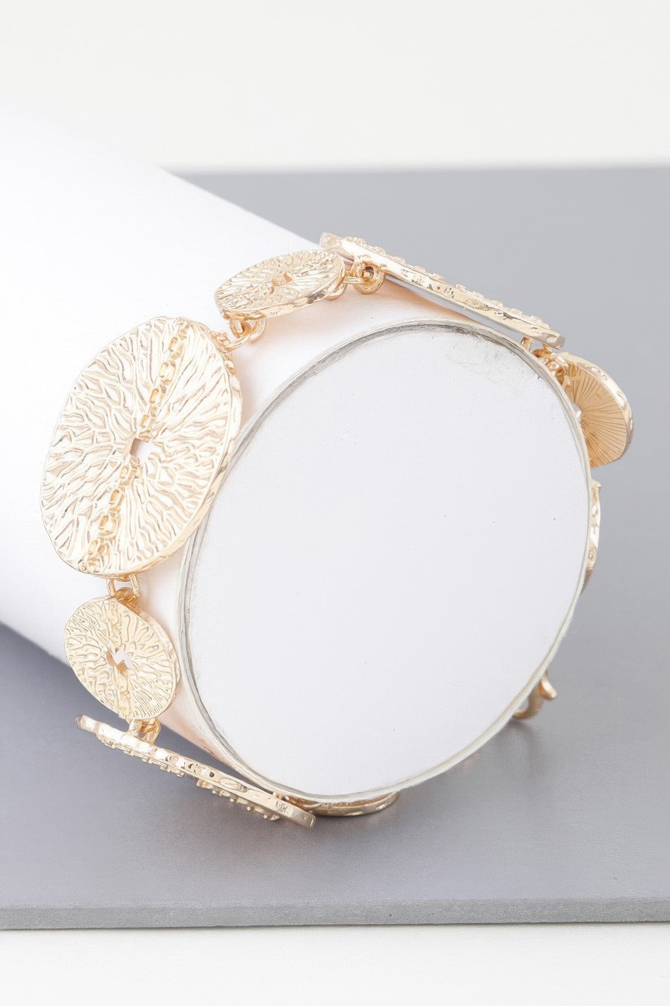 Gold Multi Hammered Disc Bracelet with scalloped discs and clasp