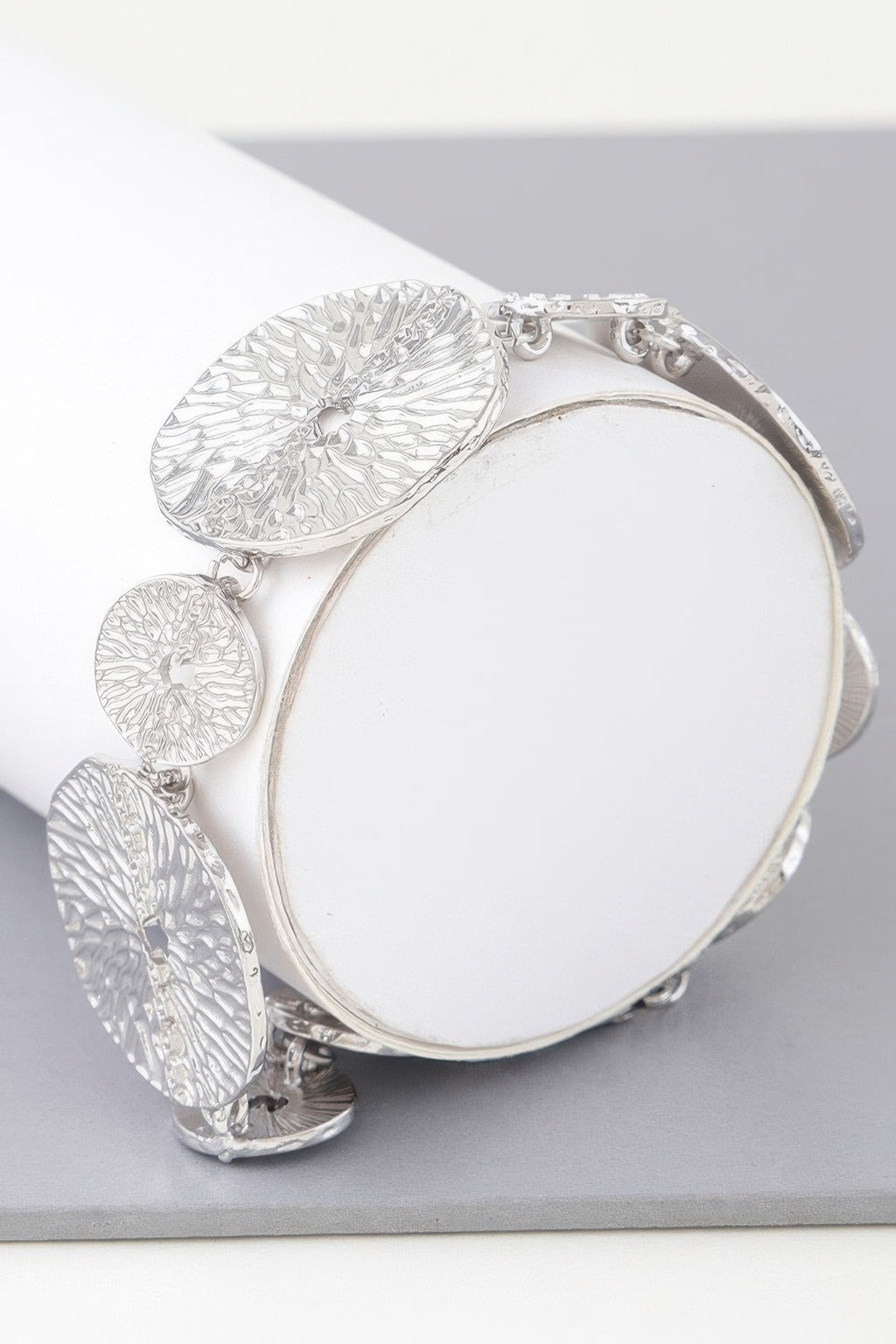 Silver Multi Hammered Disc Bracelet with textured discs and metal clasp