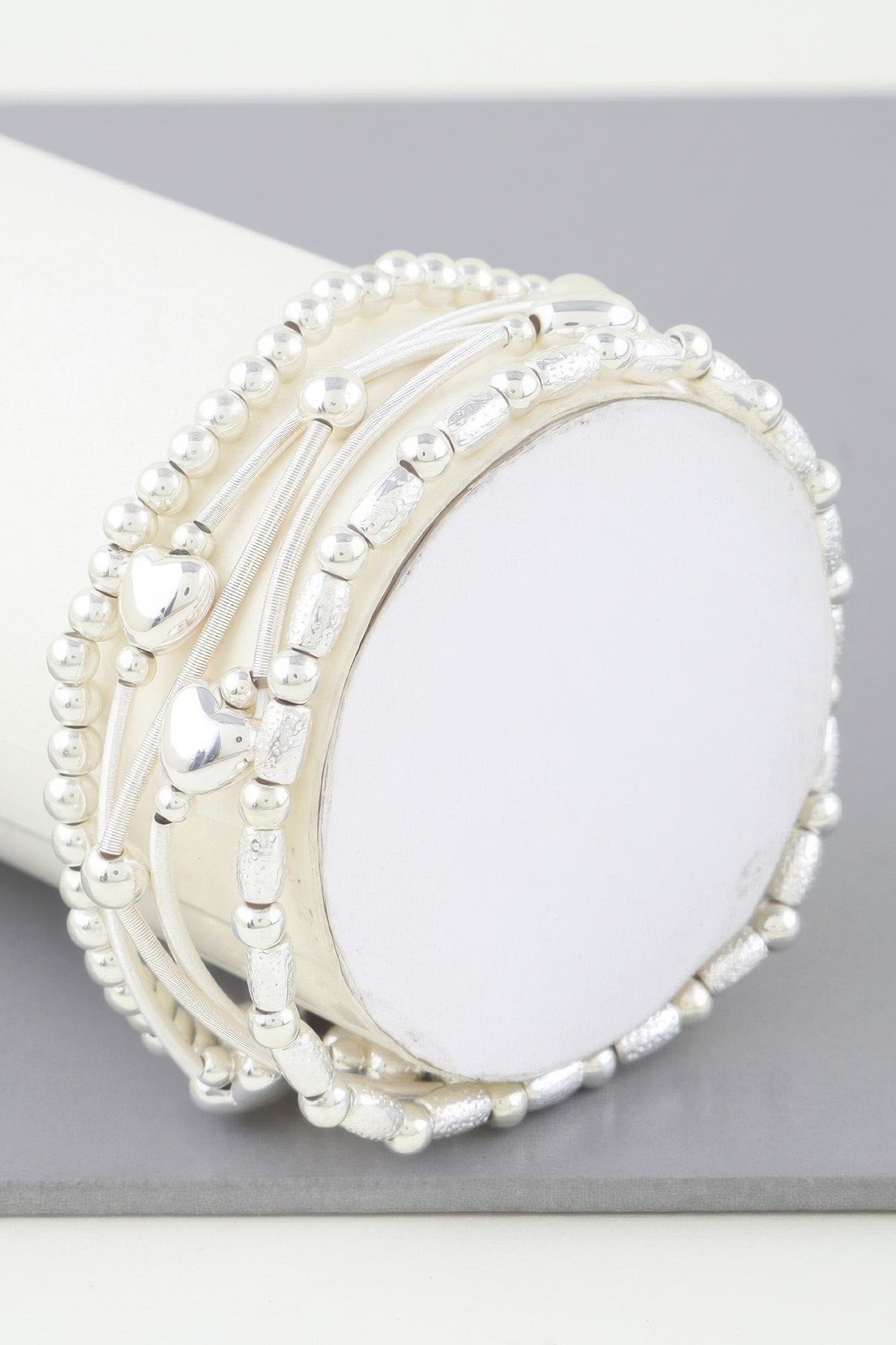 Multi Heart Coil Beaded Bracelet (Silver) with heart-shaped bead details and coils