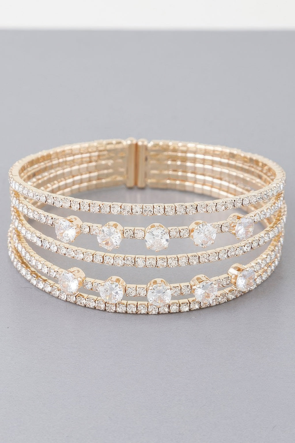 Gold-tone Multi Jeweled Cuff Bracelet with clear stones and multi-row sparkle bands