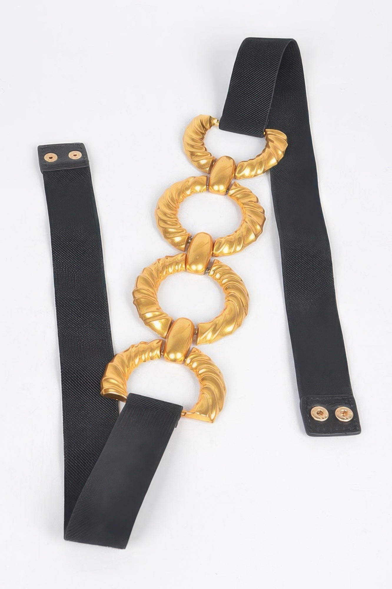Multi-buckle elastic belt: black straps with gold circular ring accents (one size)