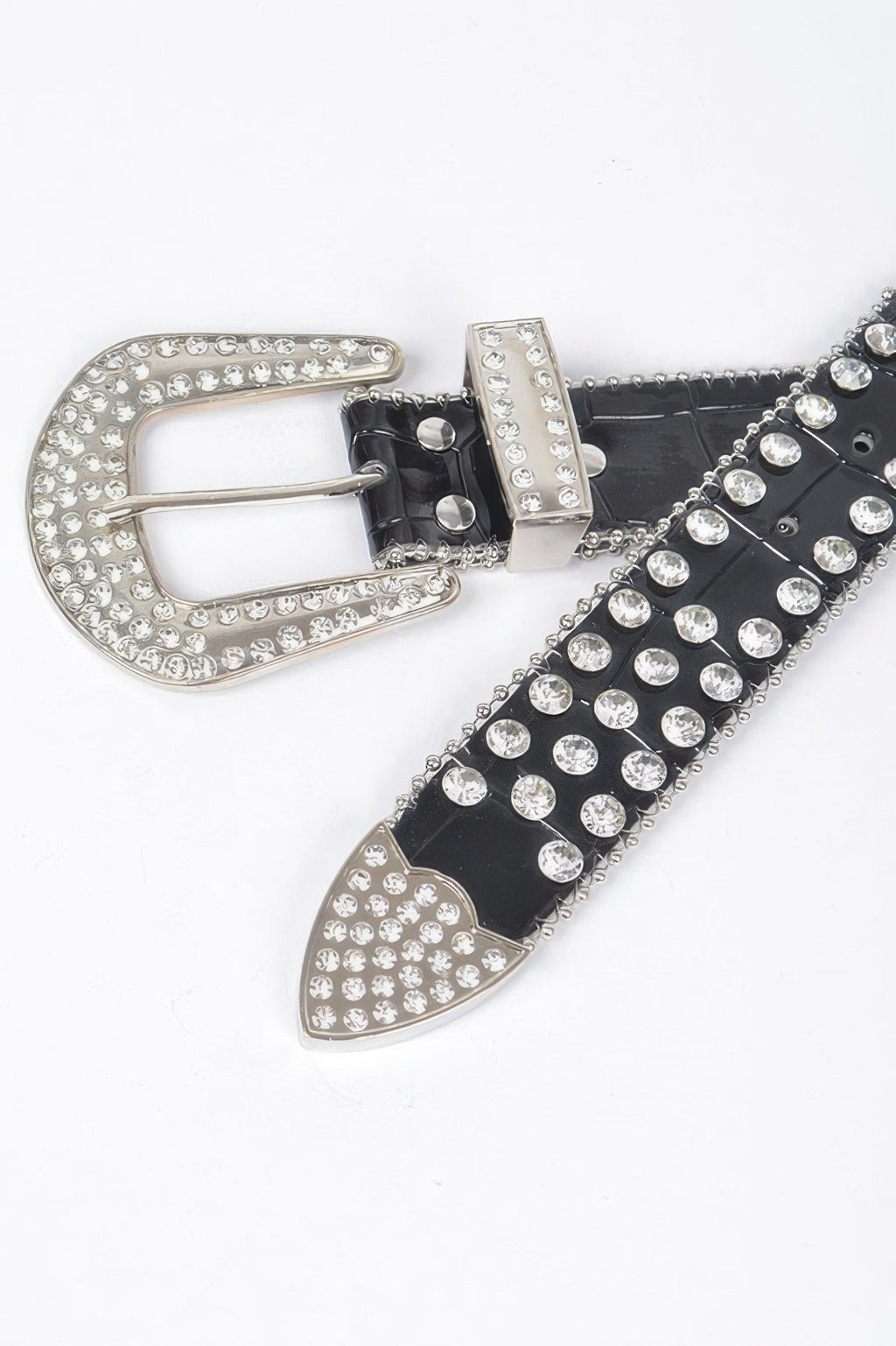 Black studded belt close-up with rhinestone oval buckle plate