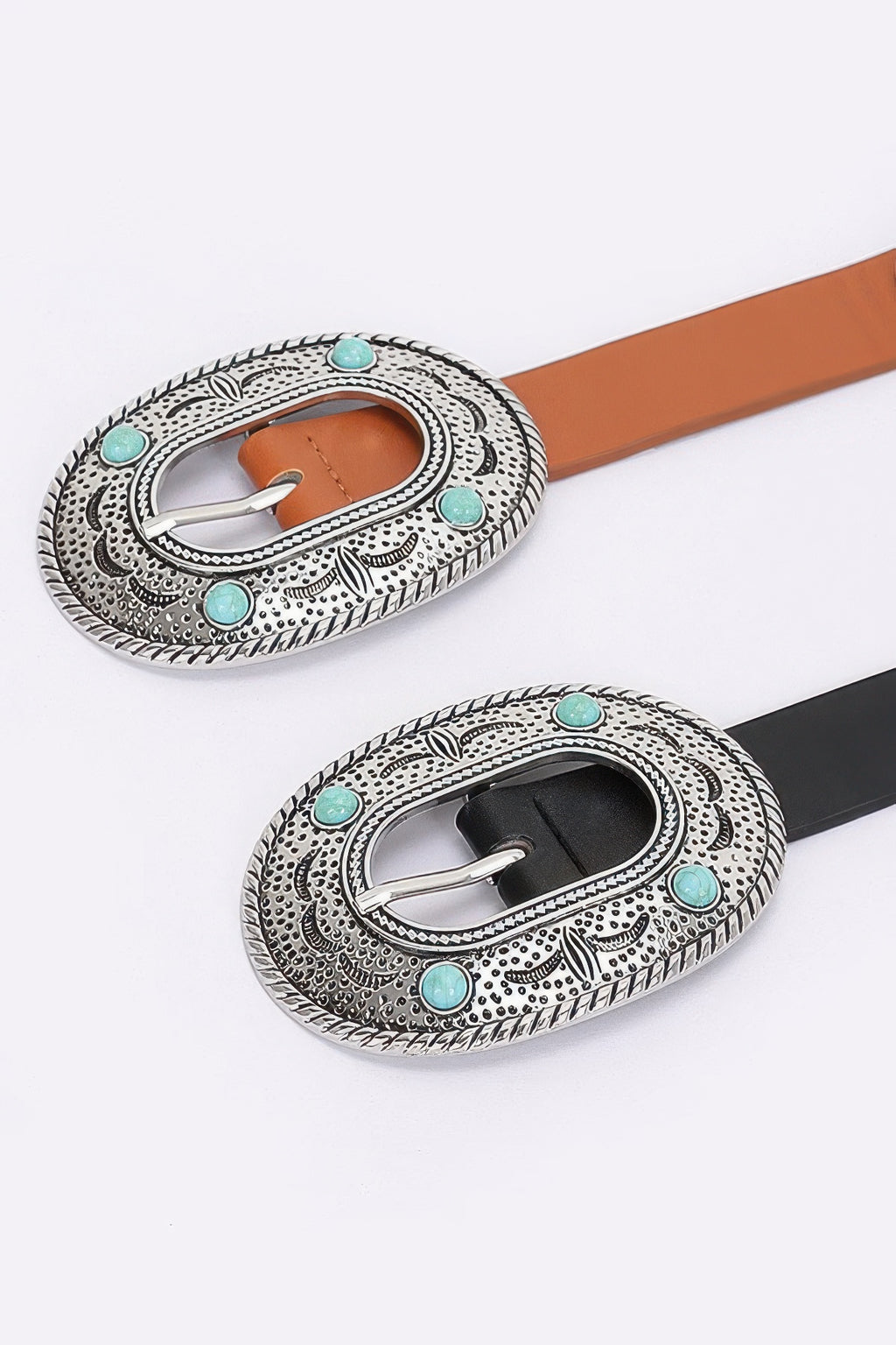Oval engraved buckles with turquoise stones on camel and black belt straps