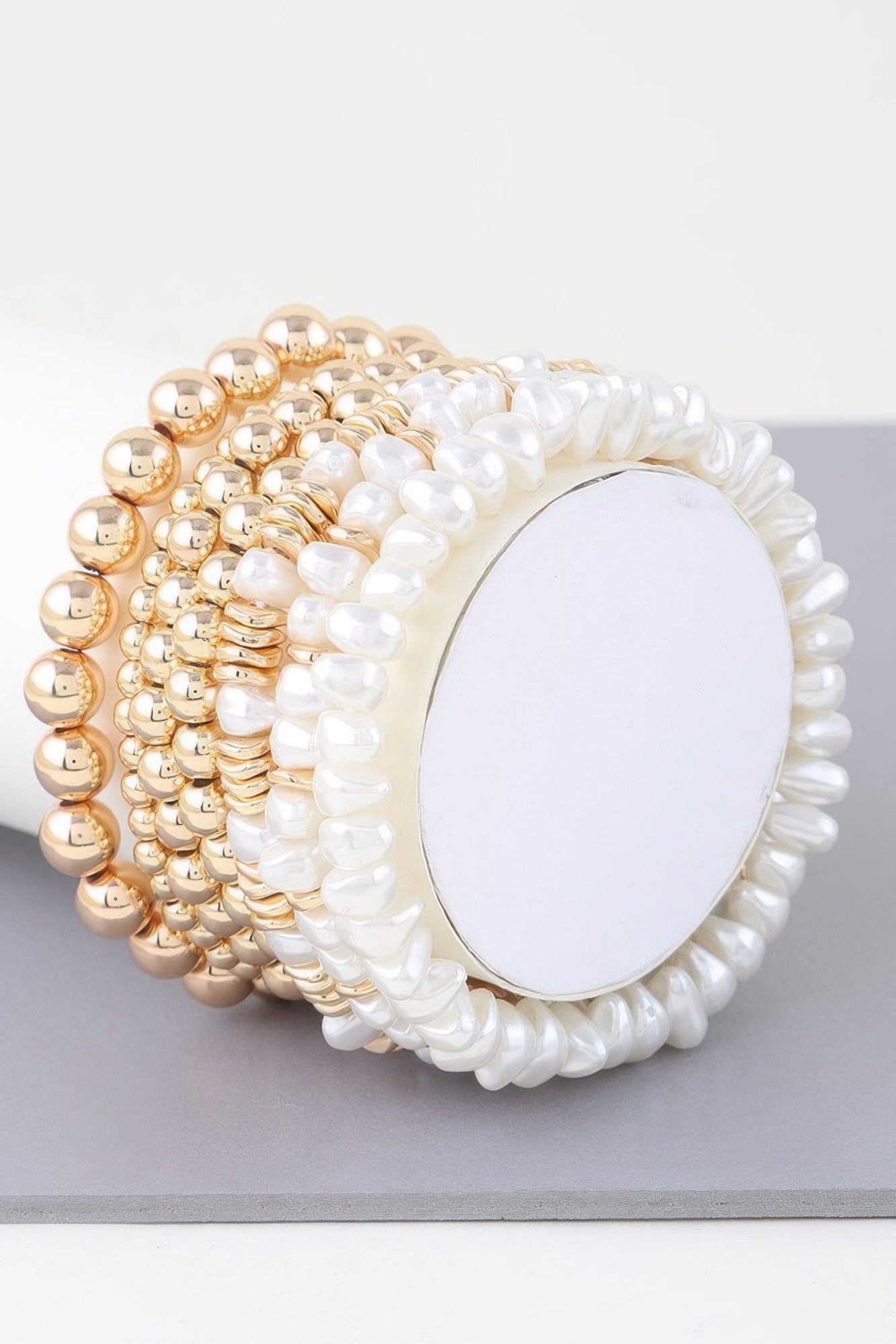 Multi pearl beaded bracelet, gold-tone and white pearls with oval center plate