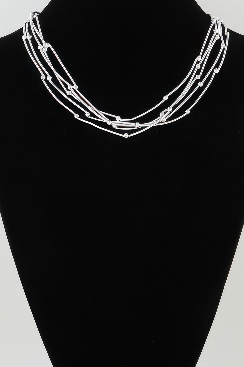 Multi pillar beaded necklace, silver-tone layered strands with round bead accents on collar