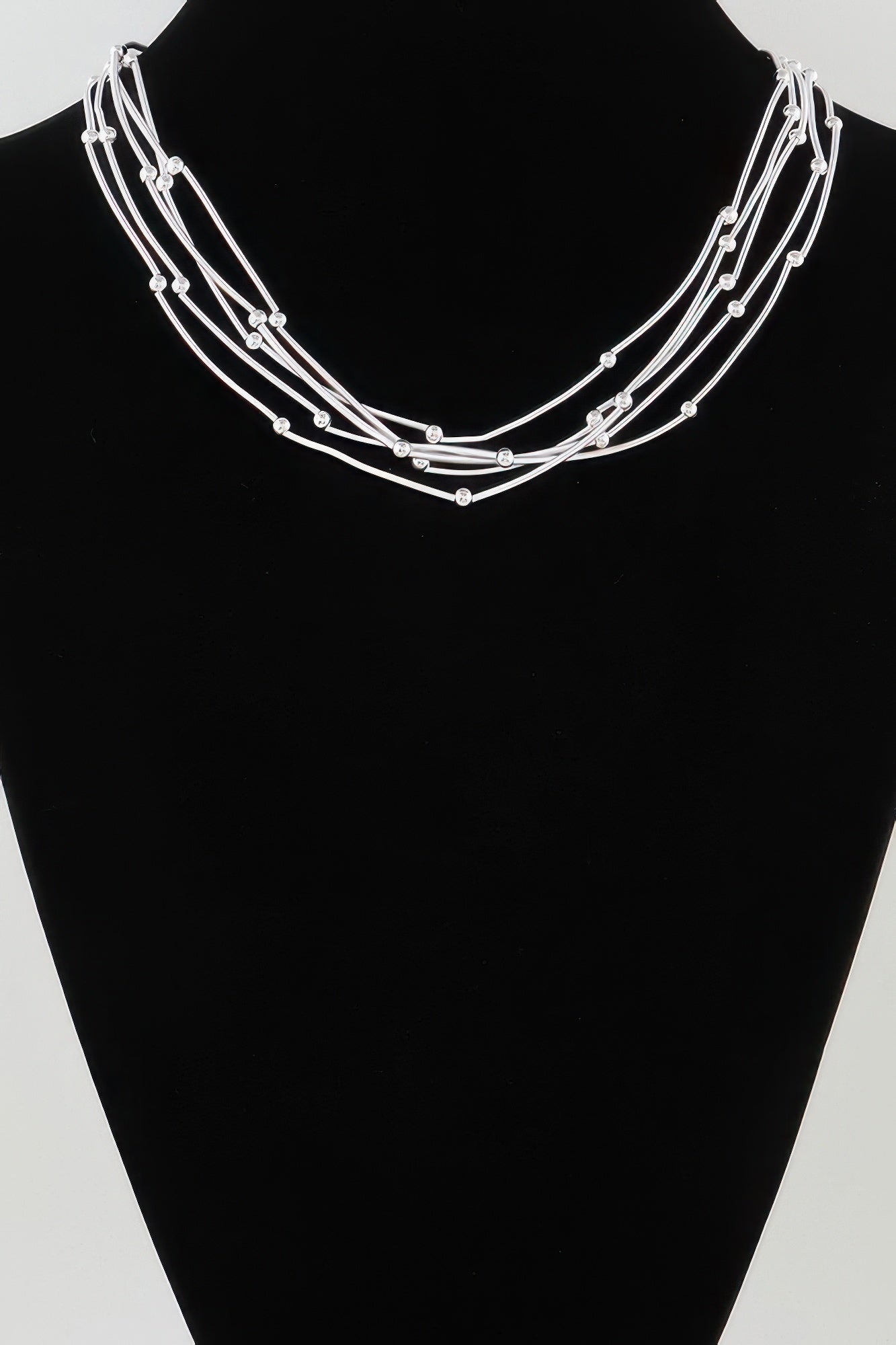 Multi pillar beaded necklace, silver-tone layered strands with round bead accents on collar