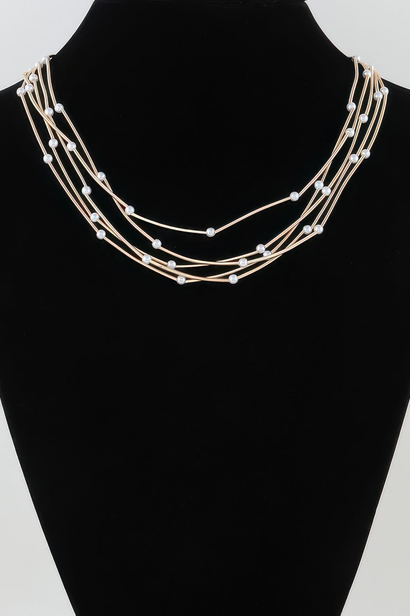 Multi pillar beaded necklace, gold-tone multi-strand design with round bead accents