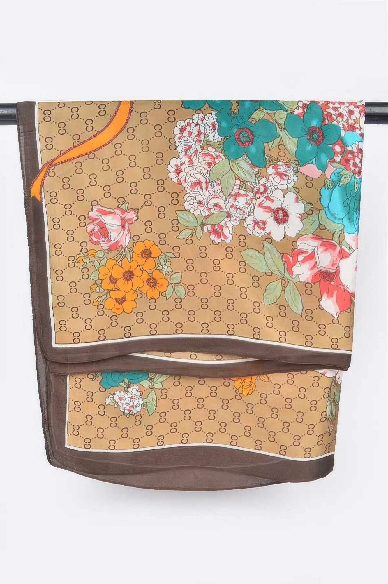 Multi print bandana folded, beige base with floral panels and dark gray edge