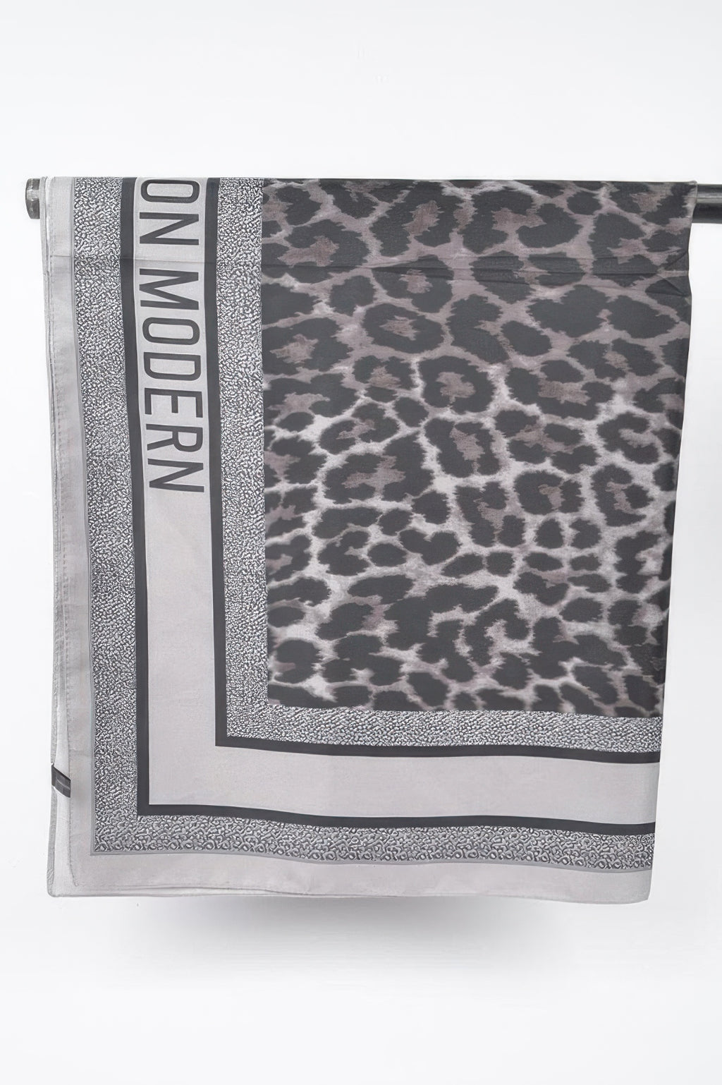 Gray Multi Print bandana folded, leopard print corner and NO MOUDEN lettering