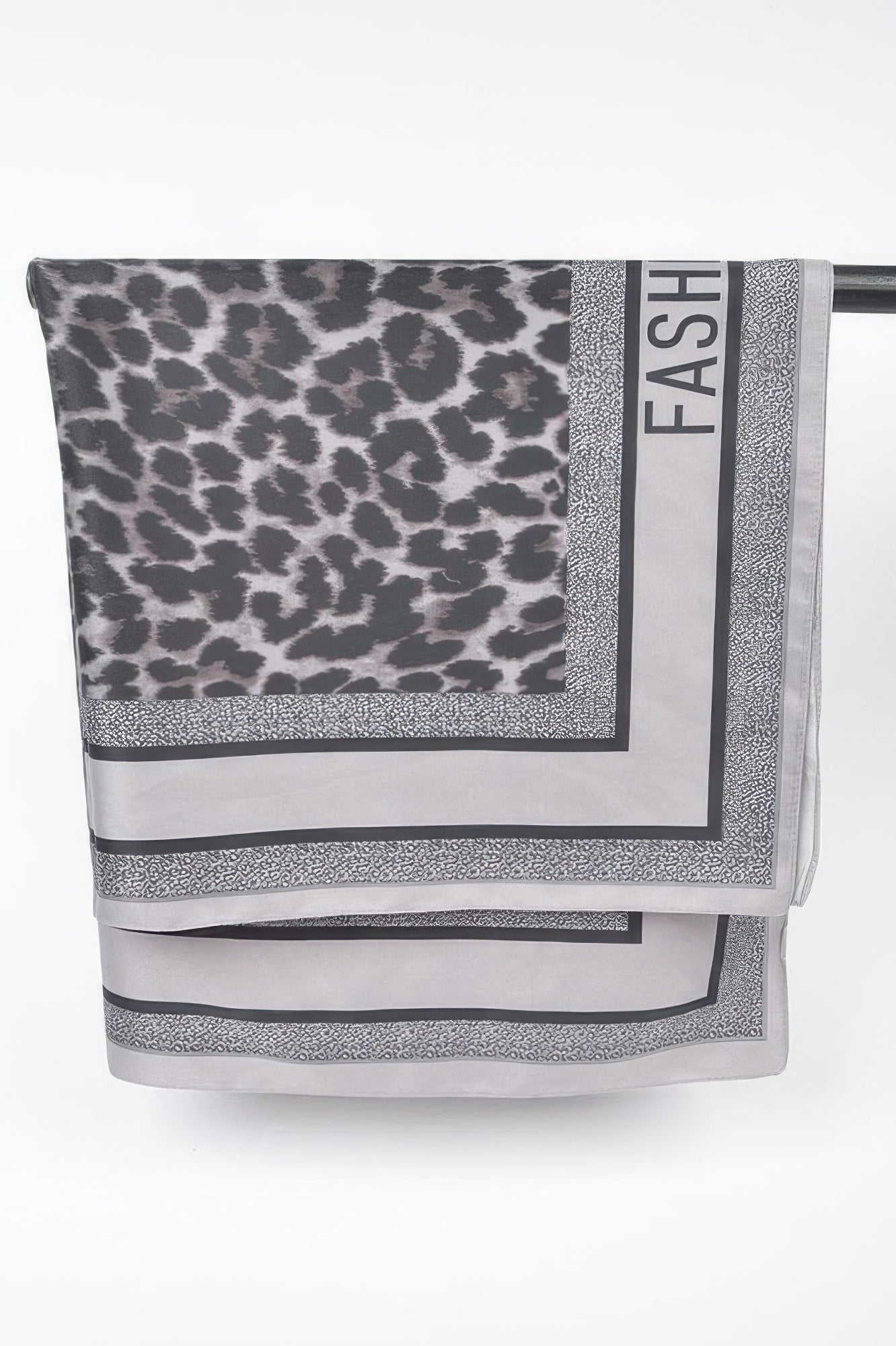 Gray Multi Print bandana folded with leopard pattern and FASTISH label