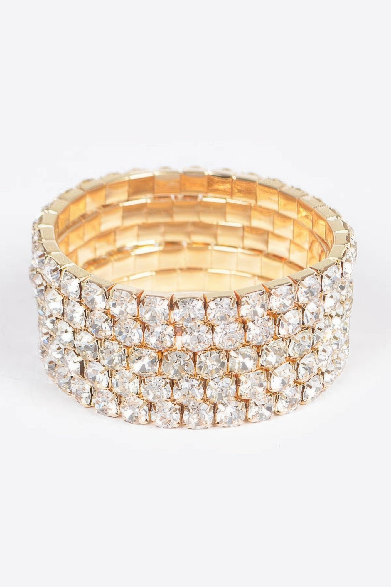 Gold multi rhinestone stretch bracelet, wide band with clear crystal row design