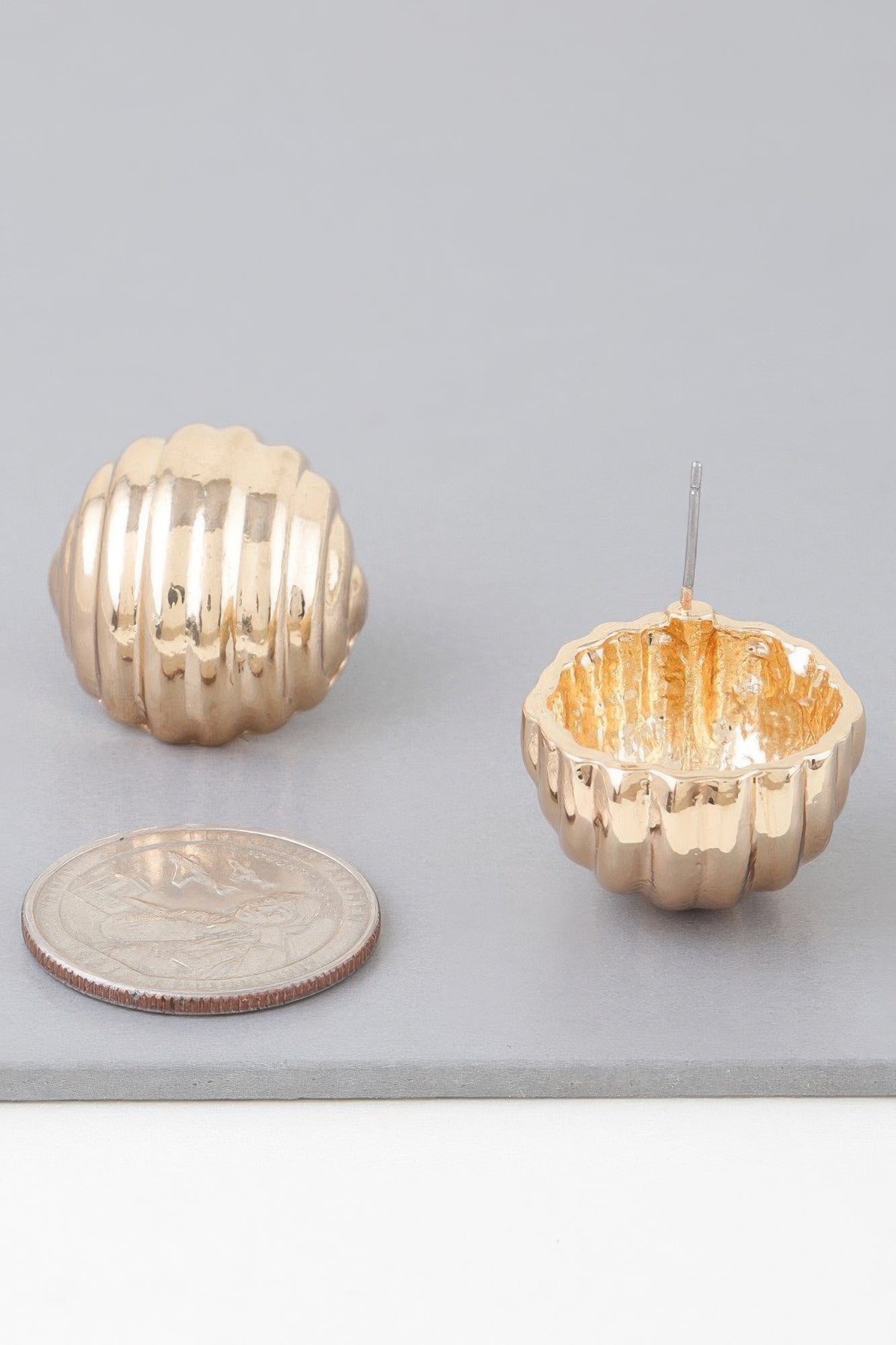 Gold ribbed dome stud earring, scalloped rim and vertical post