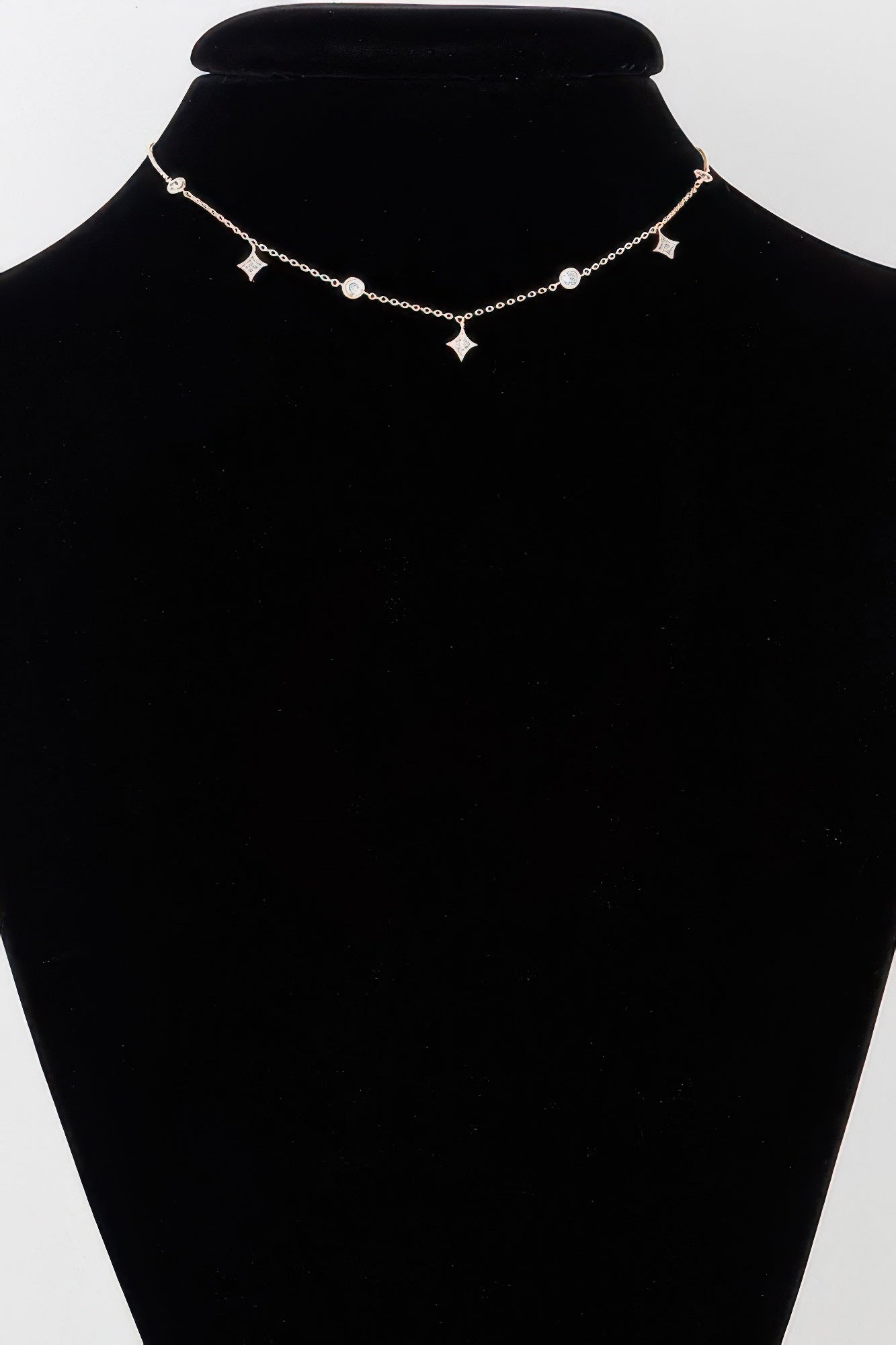 Silver necklace with star and moon charms, fine chain and dangling star drop