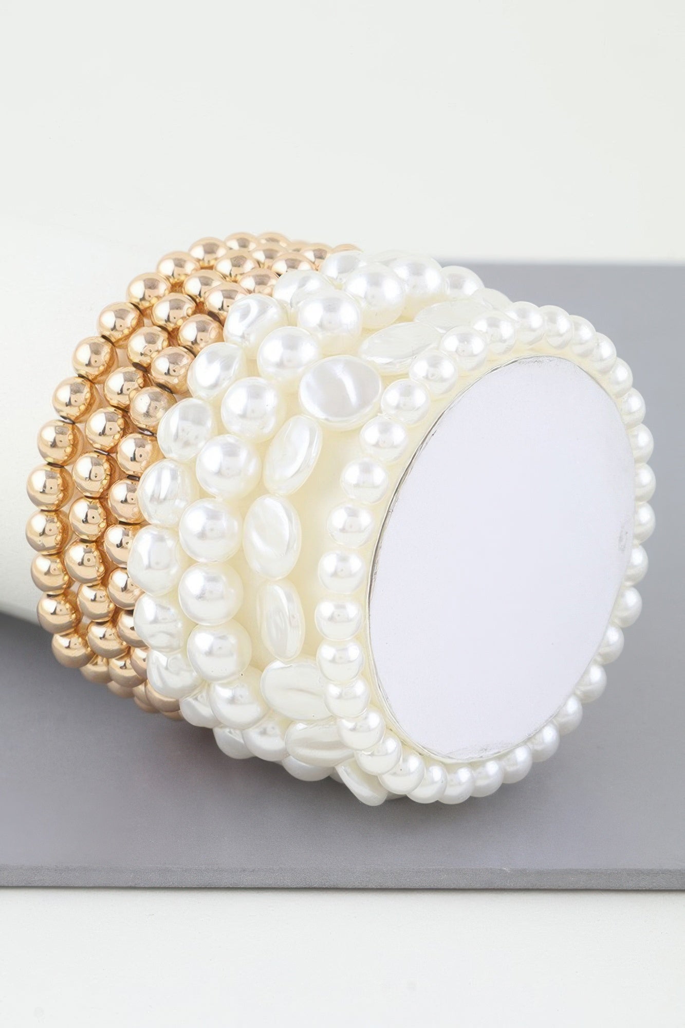 Multi Stone Beaded Bracelet with cream pearls and gold-tone beads, oval center