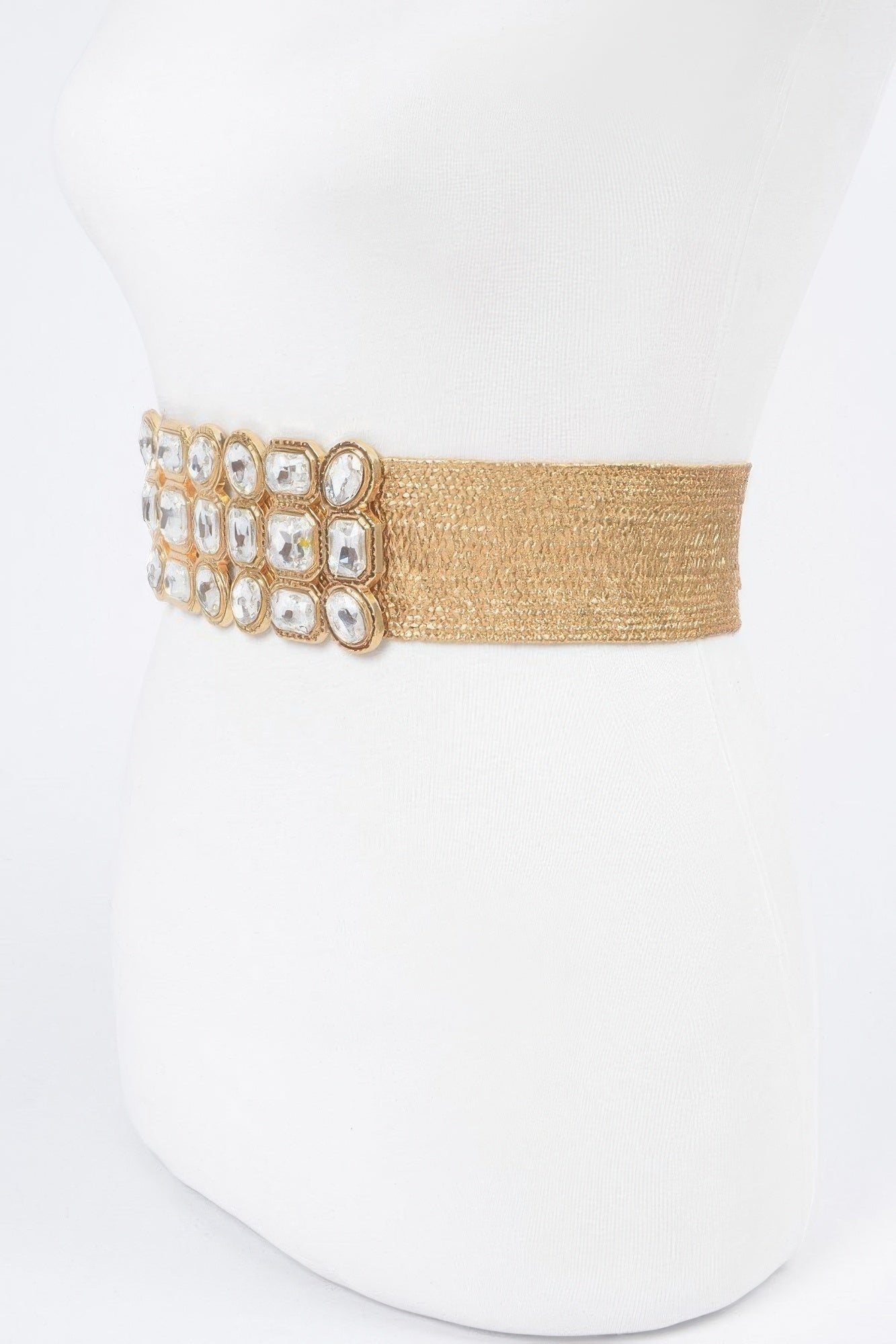 Gold metallic stretch belt with rhinestone cluster at side view, square stones
