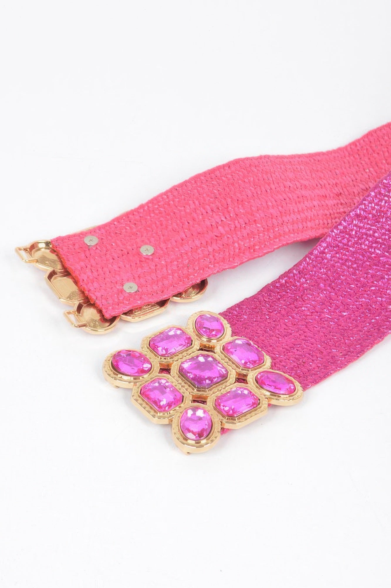 Fuchsia metallic belt with gold-tone clasp and multi pink rhinestone centerpiece