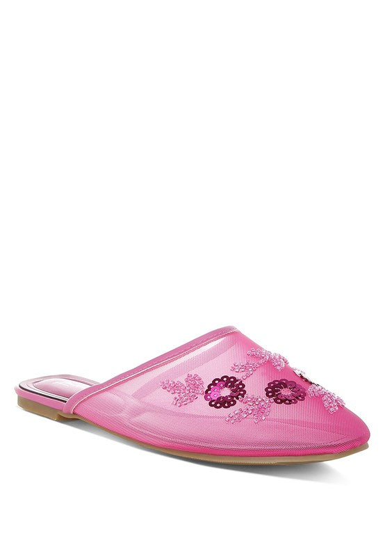 Light pink slip-on mule with mesh upper and beaded flower motifs, flat sole.