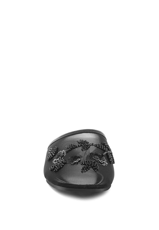 Black slip-on mule with rounded toe and beaded sequin floral detail on top