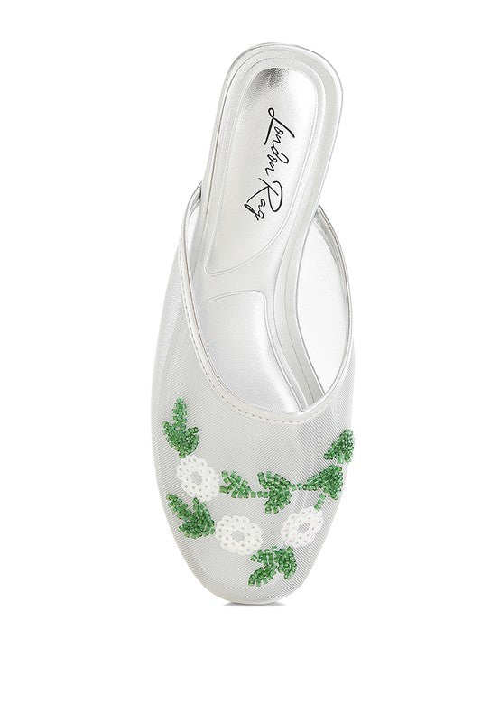 White mesh mule upper with green and white beaded flowers, slip-on