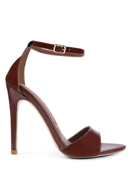 Burgundy open-toe high heel with ankle buckle strap and curved topline.