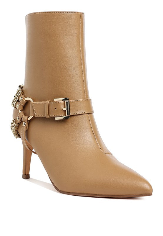 Tan stiletto ankle boot with ankle belt strap and gold-tone buckle hardware