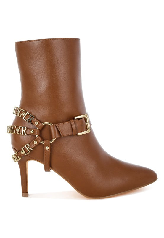 Cognac stiletto ankle boot with double harness straps and gold-tone studs