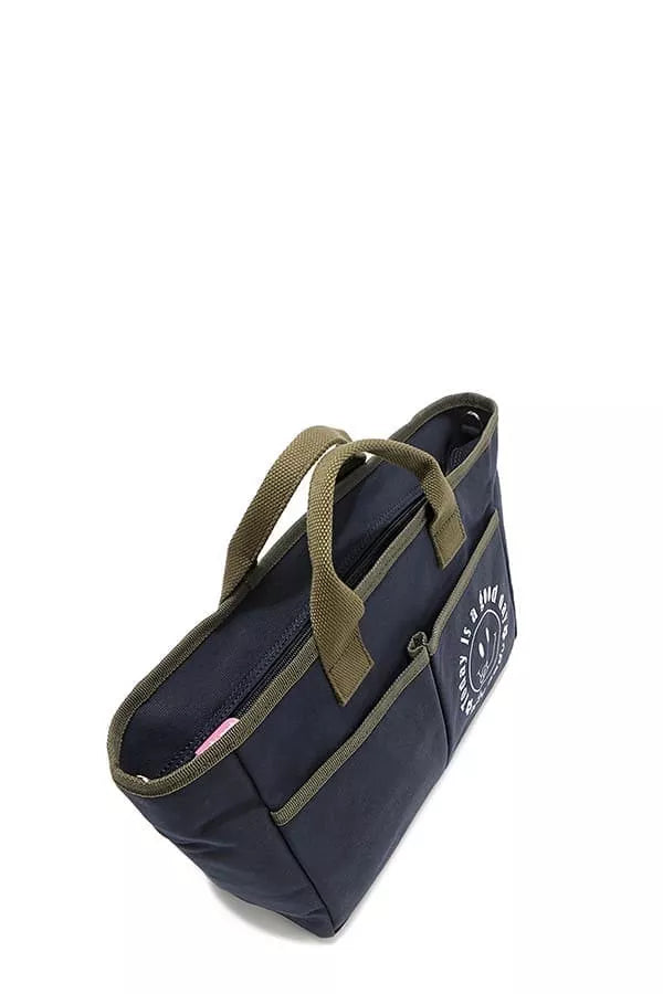 Navy canvas tote bag side view with zip pocket and olive webbing strap