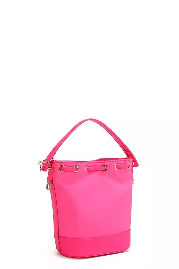 Bright pink bucket bag side view with top handle and zip pull hardware