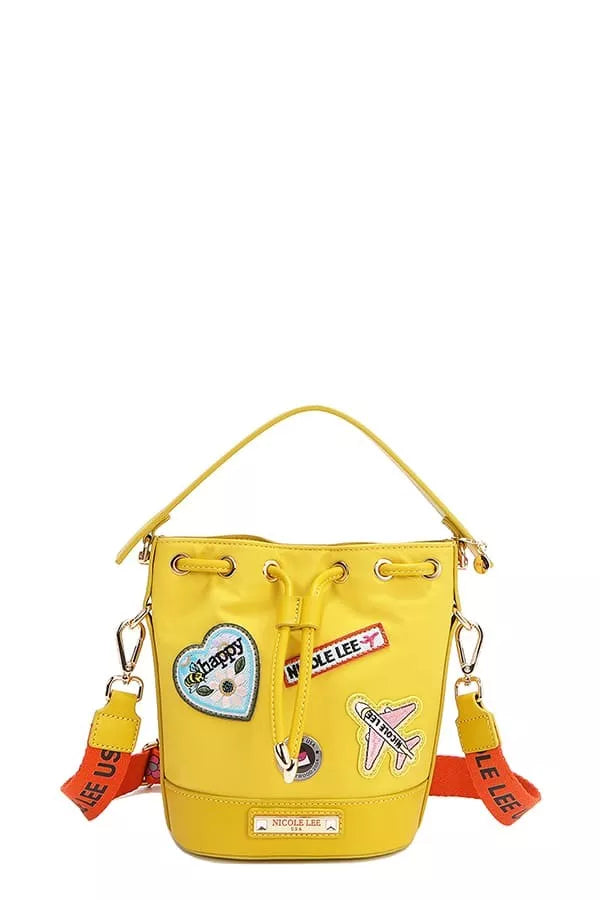 Nicole Lee USA color patch bucket bag in yellow with front charm and stitched patches