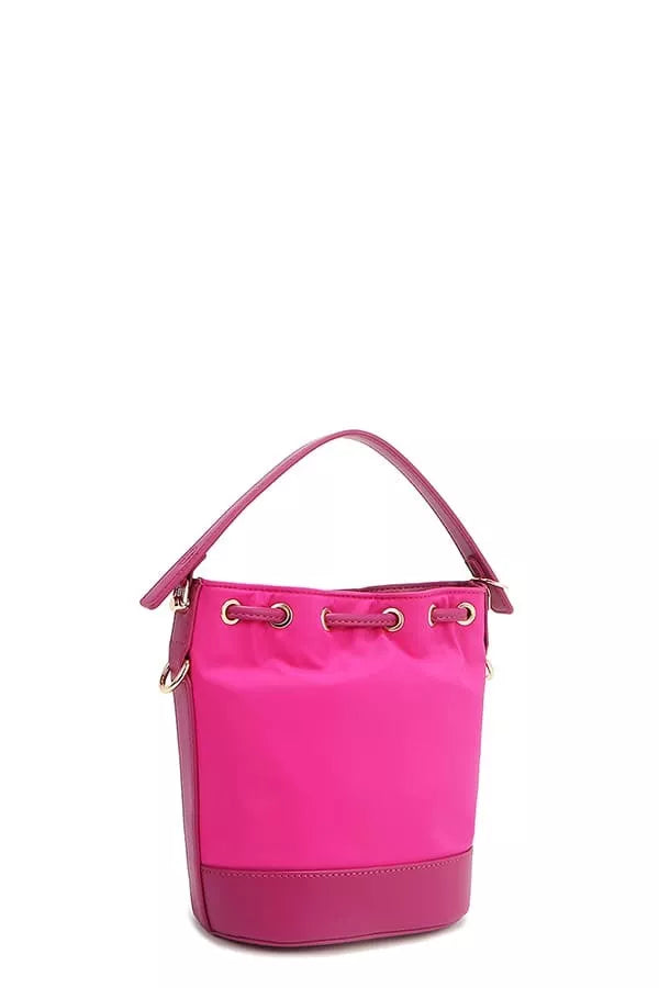 Pink bucket bag angled side view with grommet handle and top loop