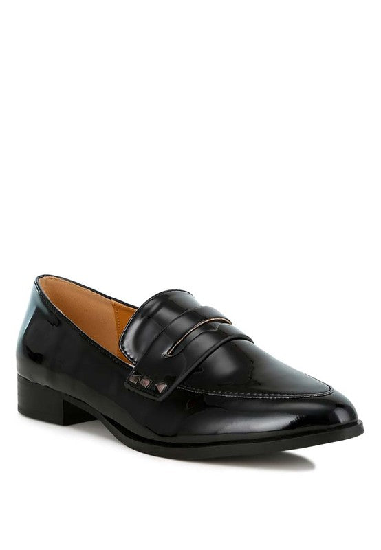 Black patent pleather penny loafers with curb strap detail