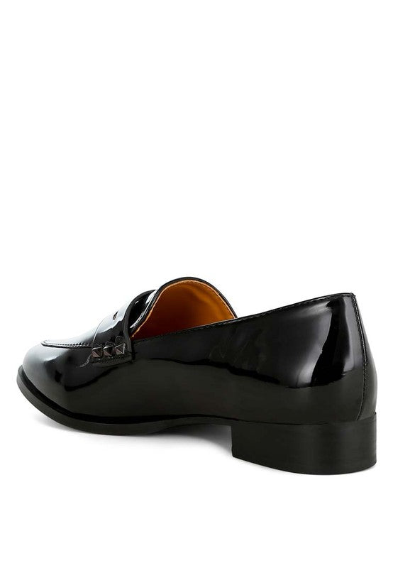 Black patent pleather penny loafers, side/back view with block heel
