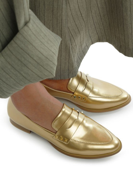 Gold patent pleather penny loafers with studded strap detail