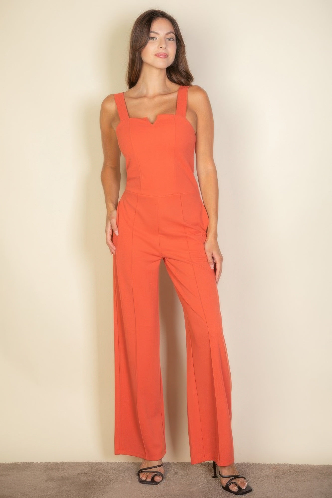 Notched neck cami jumpsuit in rust orange, sleeveless wide-leg with straight straps