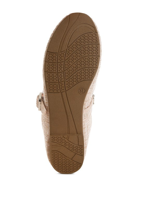 Beige tweed Mary Janes embellished charm; textured outsole view