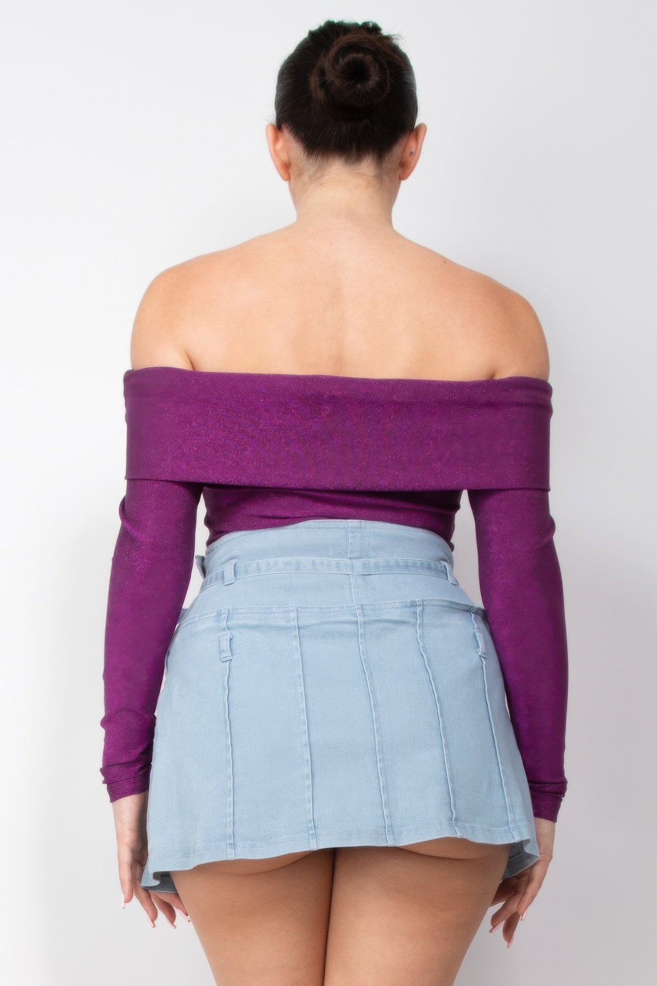 Back view: Purple glitter off-shoulder long-sleeve bodysuit with straight back panel.