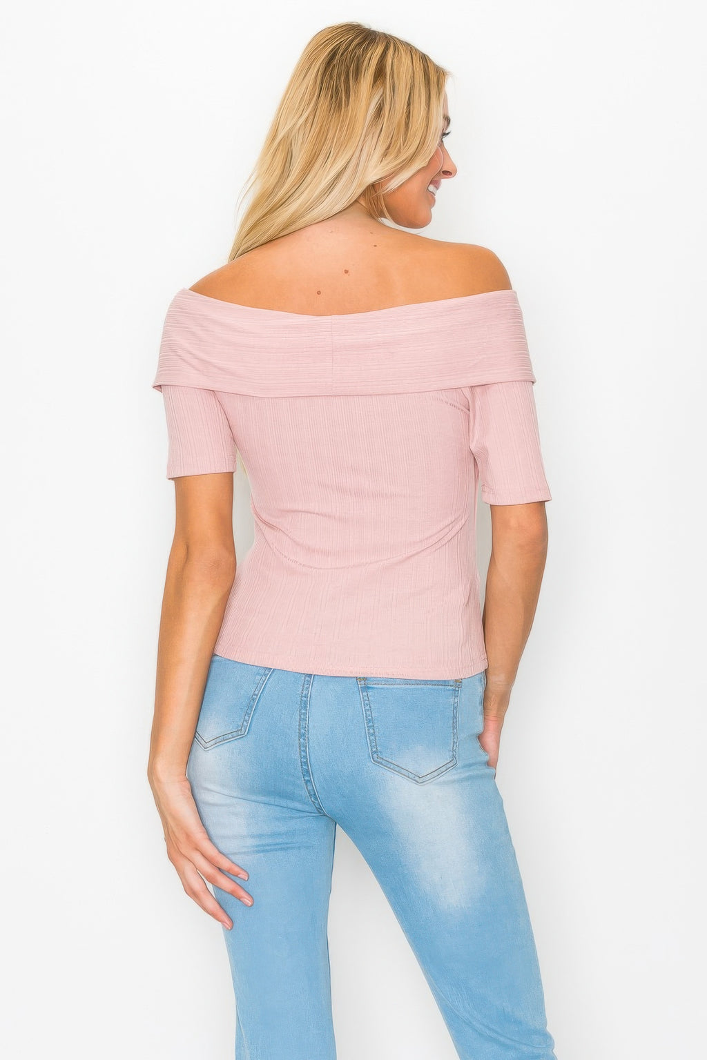 Back view of dusty pink off-shoulder ribbed top with wide neckline