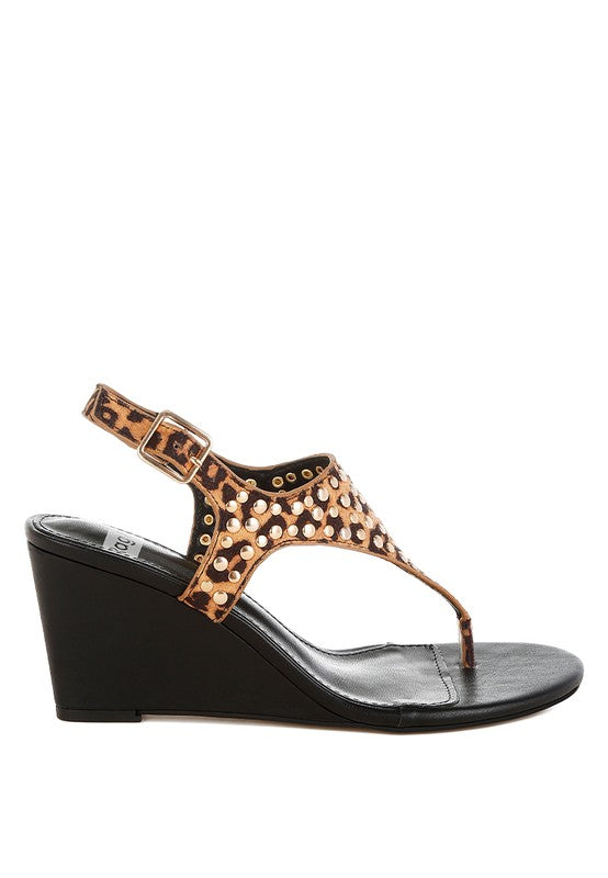 Studded leopard T-strap wedge sandal with open toe and ankle buckle