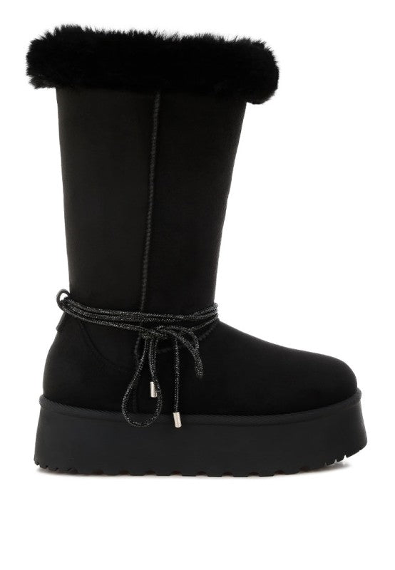 Black calf snow boots with faux fur cuff and lace tie strap across the top