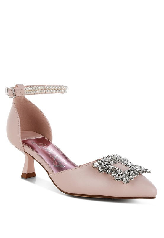 Pink kitten-heel sandals with jeweled brooch strap and ankle buckle