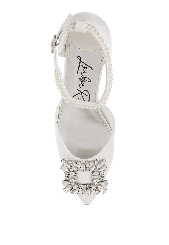 White slingback kitten heel sandal with pearl trim and rhinestone toe embellishment
