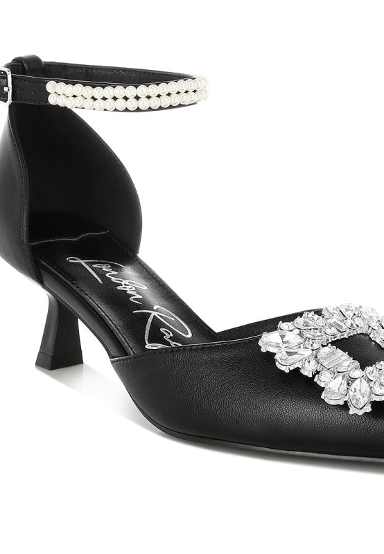 Black leather-look kitten heel shoe with rhinestone toe detail and pearl bracelet strap