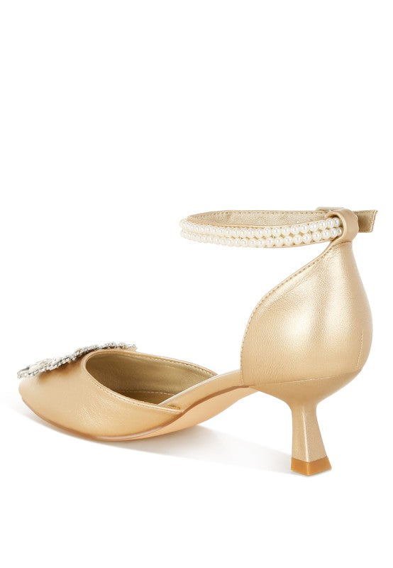 Beige satin kitten heel sandal with pearl-trim slingback strap and pointed toe