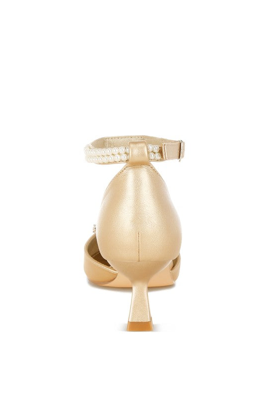 Kitten-heel sandals, rear view: adjustable ankle strap with rhinestone detail
