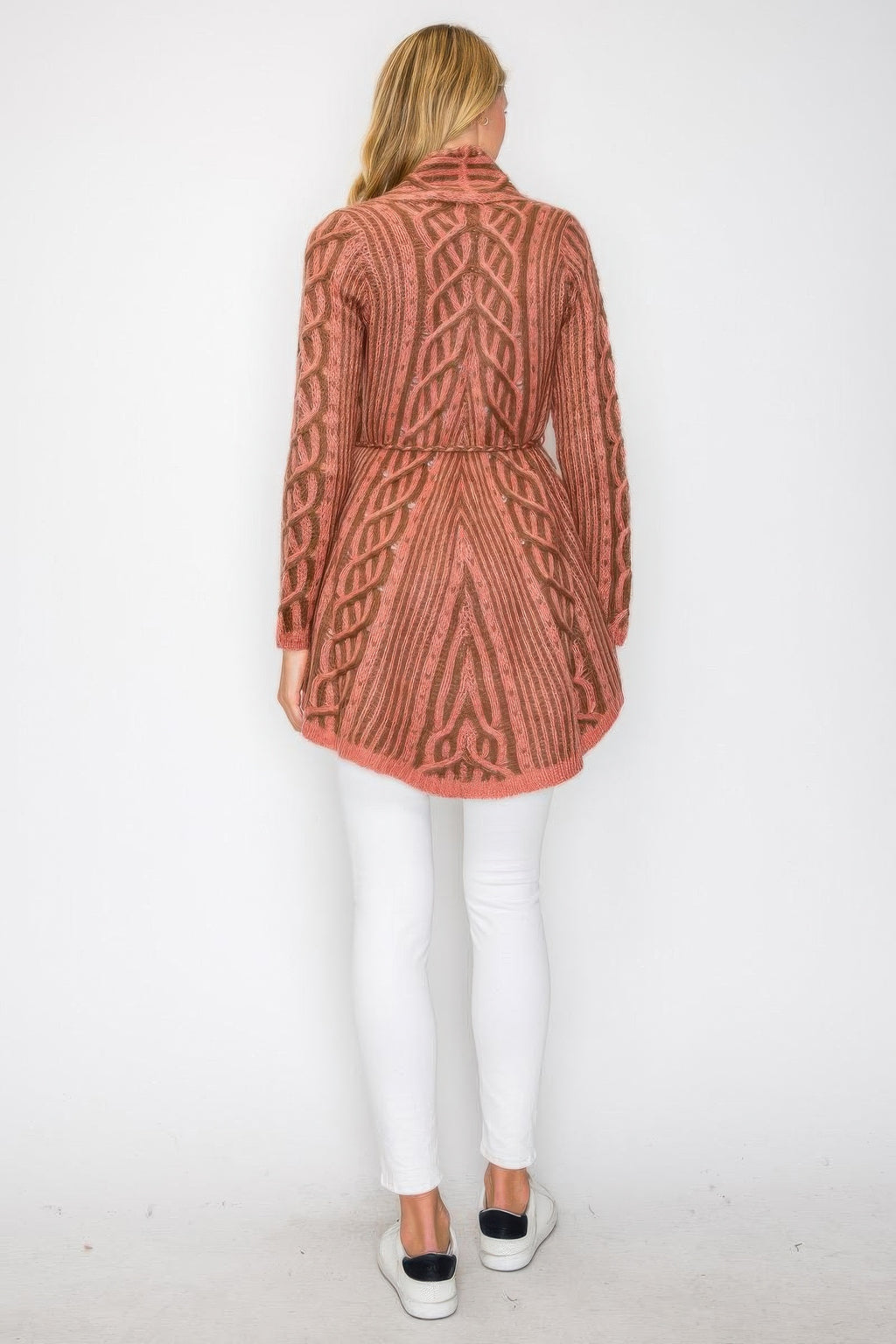 Back view of pink open wool cardigan with belt tie and knit pattern