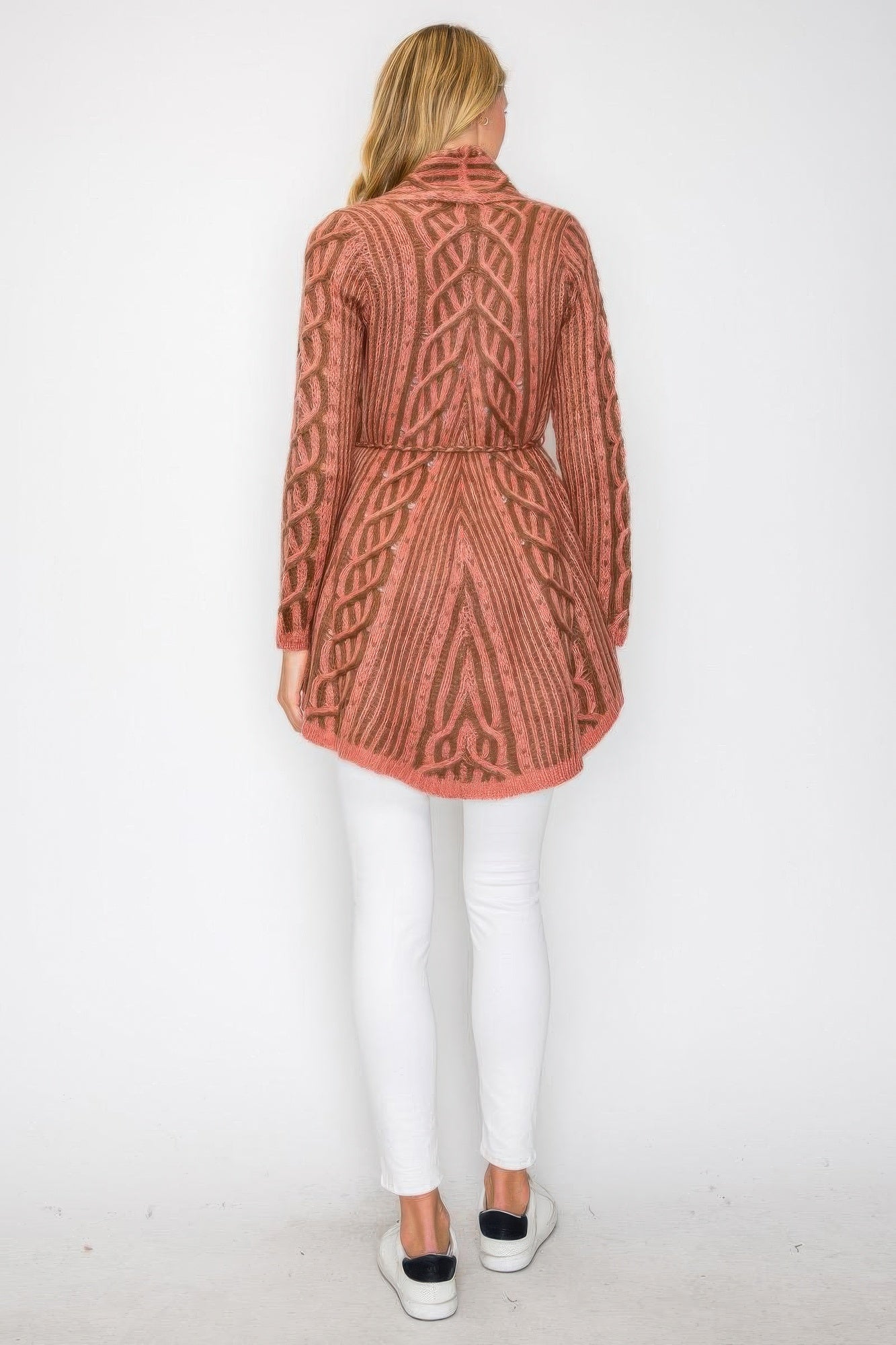 Back view of pink open wool cardigan with belt tie and knit pattern