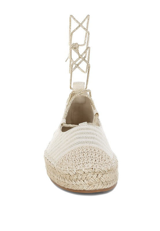 Gold canvas woven espadrille, back view showing crisscross ankle ties and jute sole