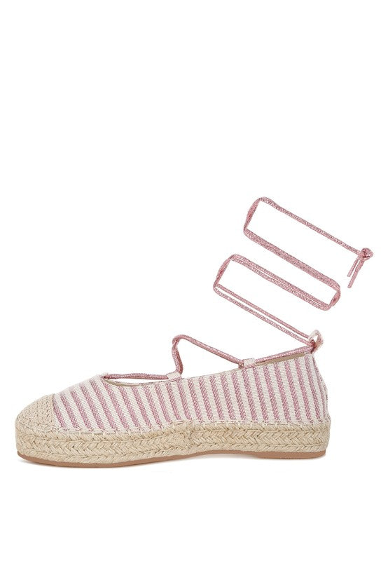 Pink striped canvas woven espadrille with ankle tie straps and braided jute sole