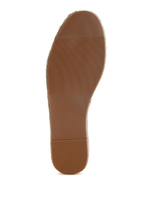 Espadrille outsole view in light brown with textured tread sole